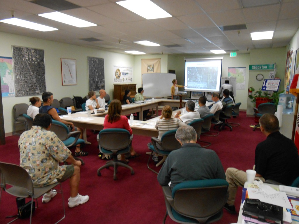 Community members review results of pedestrian and bicycle counts at and near Fruitridge / Stockton in July 2012